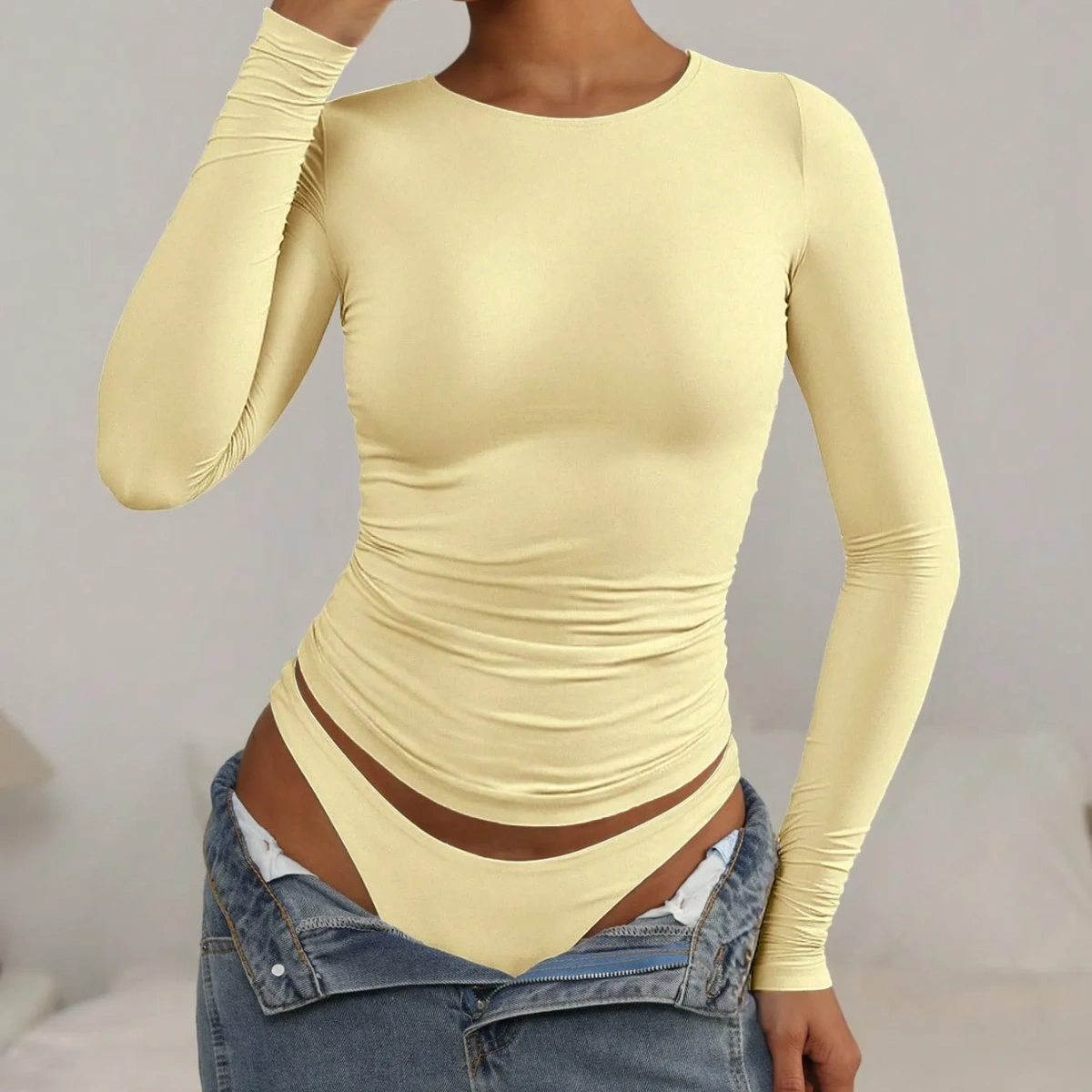 Blusa manga larga entallada