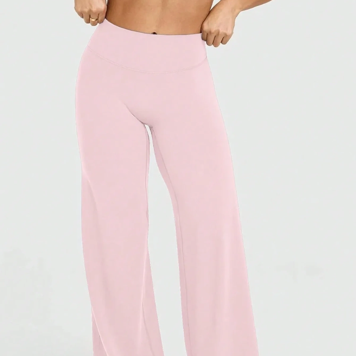 Pantalones anchos rosados adecuados para hacer ejercicio